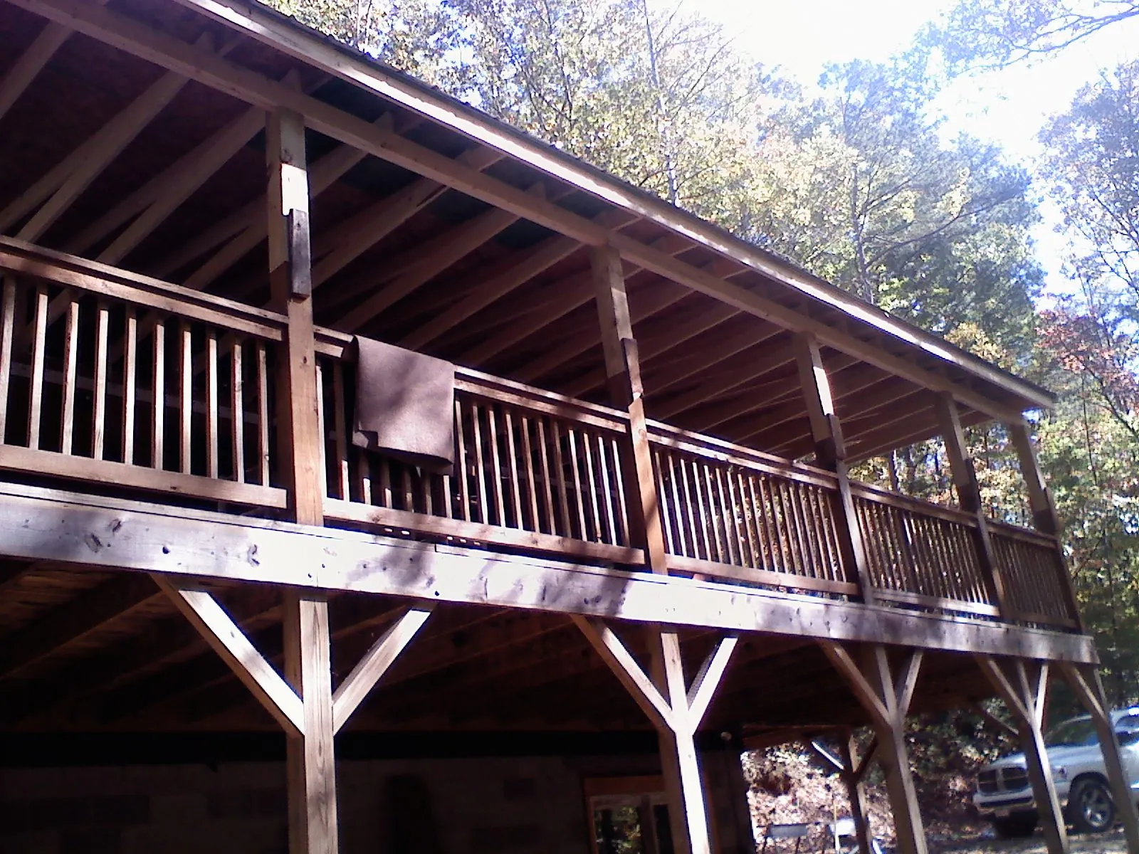 Timber framing under a new elevated porch and deck — Roof Leak Repair in Newark Valley by Roofing Brothers
